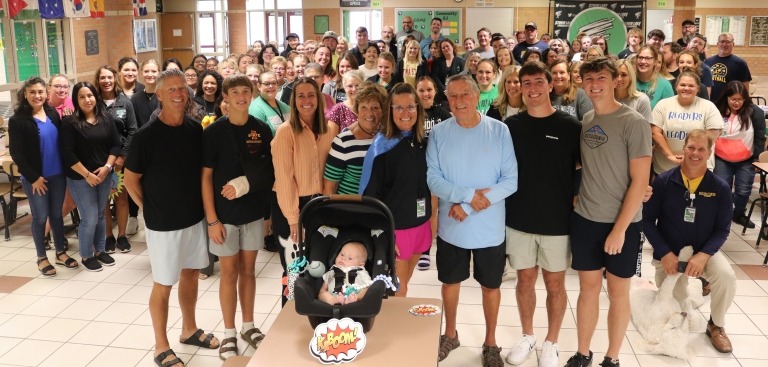 Group photo including Storm Lake Middle School staff, BVRMC staff, Chris Jungers and her family.